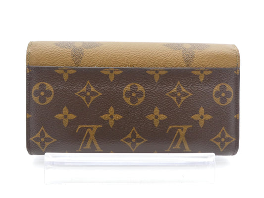 LOUIS VUITTON Monogram Giant Reverse Portefeuille Sarah Wallet with IC Reaction