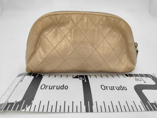 CHANEL Gold Pouch