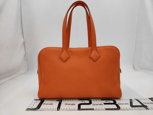 HERMES Victoria 35 Orange Taurillon Sterling Silver Hardware T Stamp Handbag