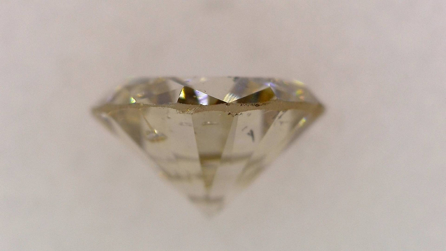0.708ct UNDER S) LIGHT BROWN SI-2 GOOD/FR/FR MEDIUM BLUE NATURAL 5.76-5.85X3.40mm Loose Diamond