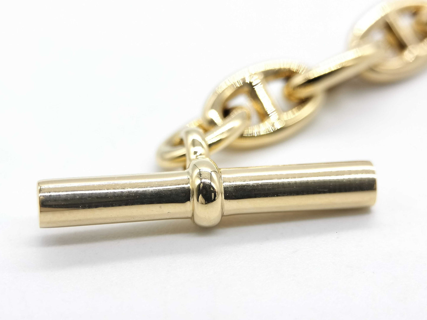HERMES Chaine d'Ancre TPM 22-link bracelet in YG and Au750, weighing 19.4g