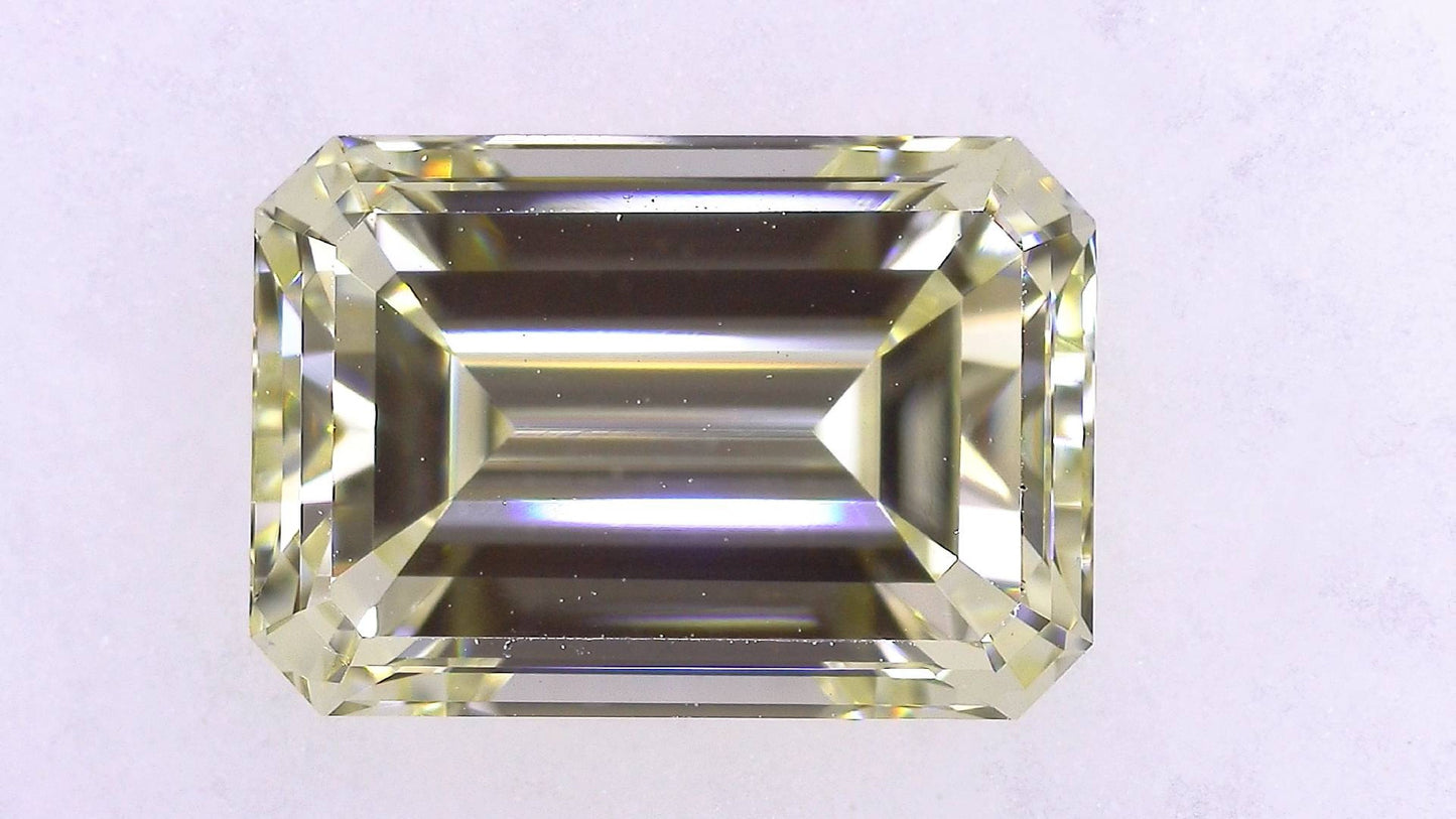 1.504ct UNDER N)VERY LIGHT YELLOW VS-1 ****/GD/GD STRONG BLUE NATURAL 7.87-5.45X3.62mm EM Diamond Loose