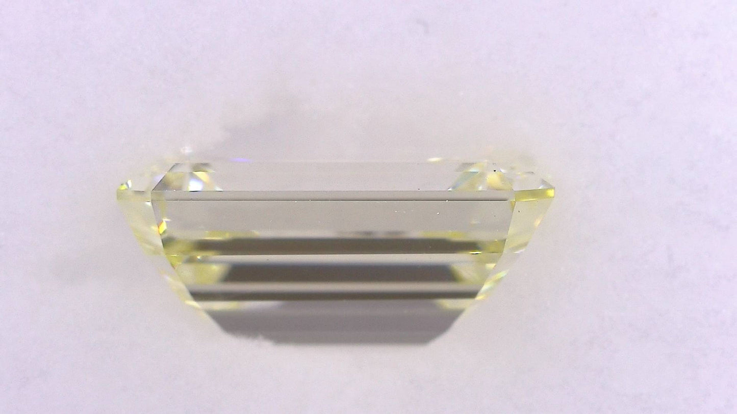 1.504ct UNDER N)VERY LIGHT YELLOW VS-1 ****/GD/GD STRONG BLUE NATURAL 7.87-5.45X3.62mm EM Diamond Loose