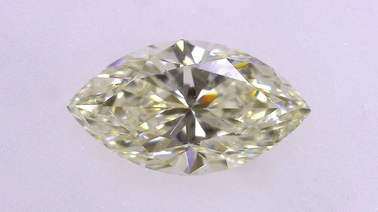 1.074ct UNDER N)VERY LIGHT YELLOW VS-1 ****/GD/GD FAINT NATURAL 9.44-5.24X3.73mm MQ Diamond Loose