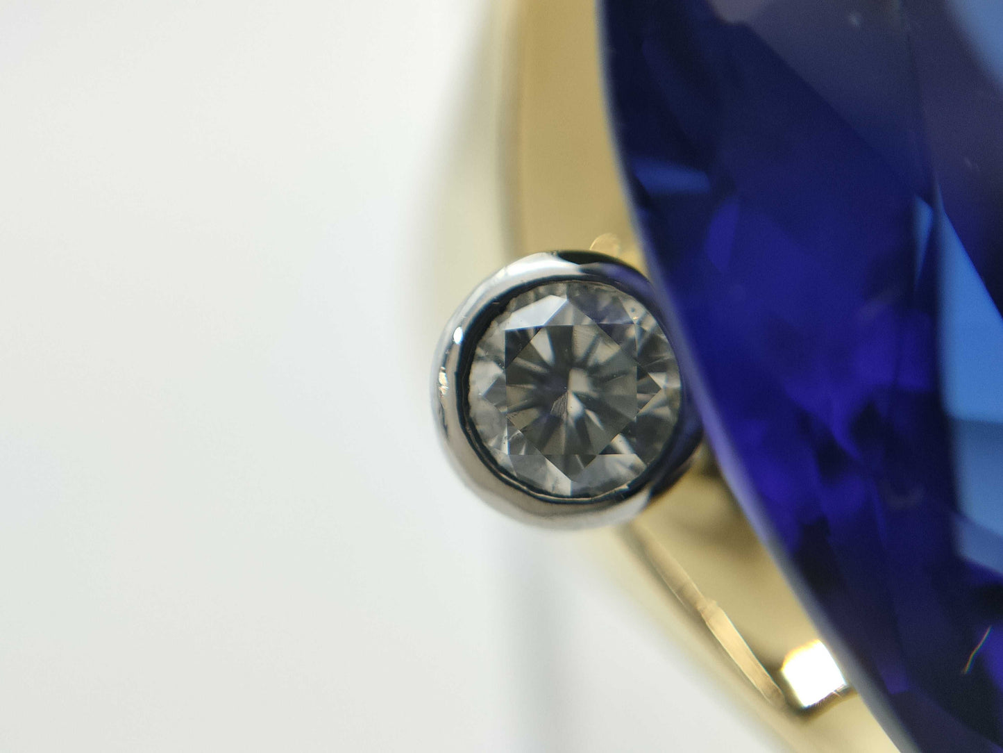 TZ21.76ct D0.22c K18/PT900 18.1g Ring