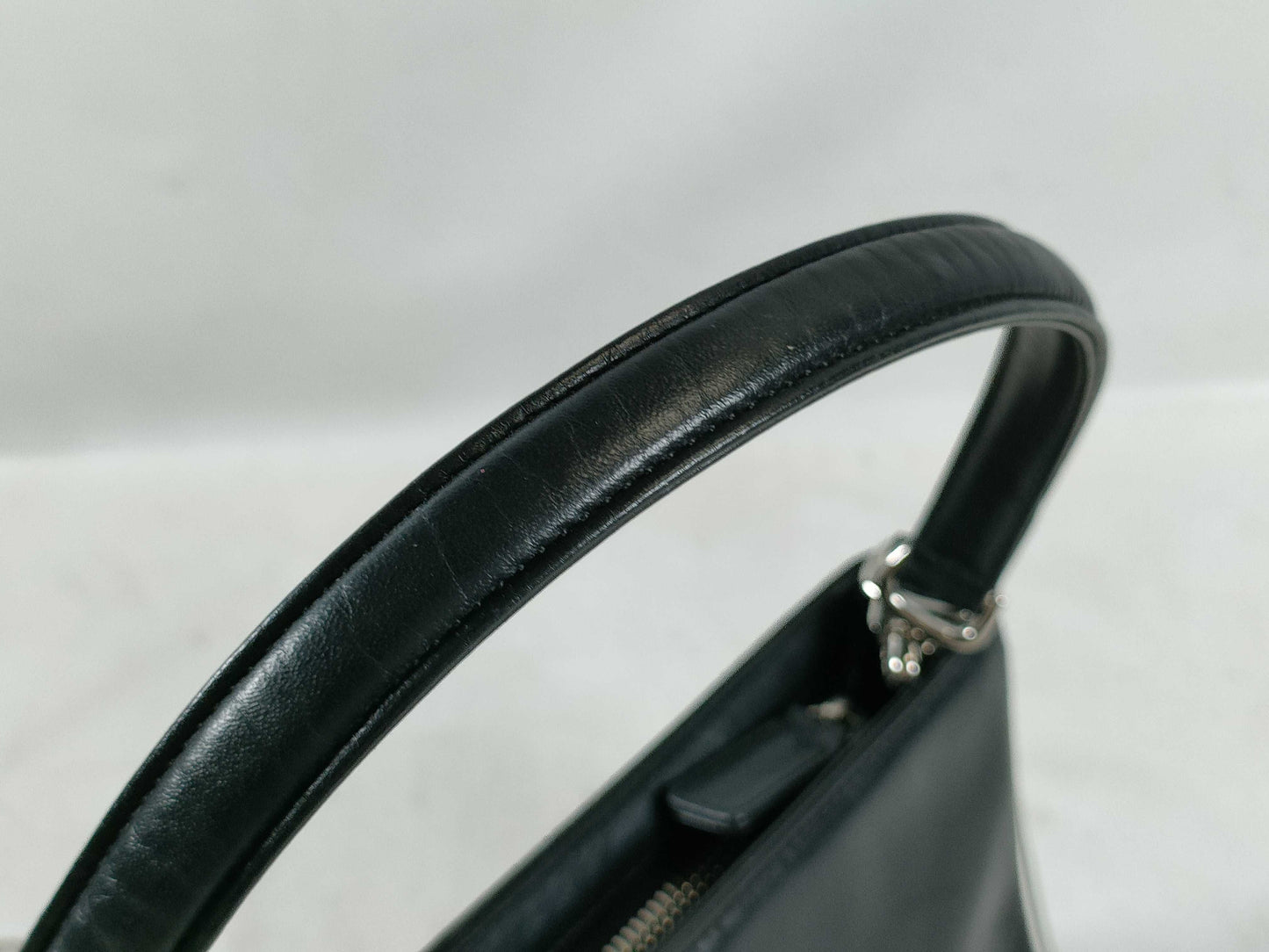 agnes b. one-shoulder leather shoulder bag