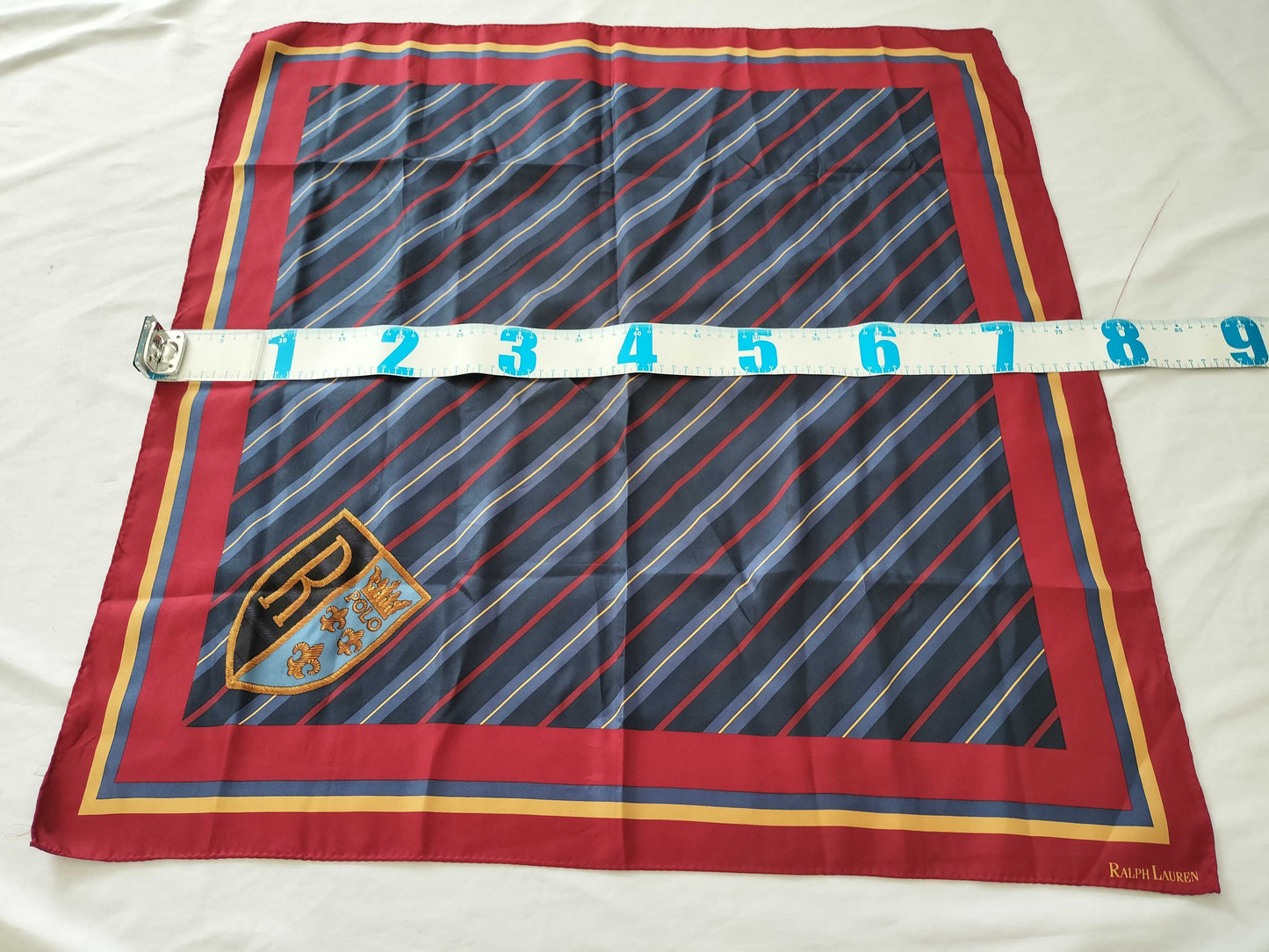 Yves Saint Laurent, Ralph Lauren, and other scarves, 4 scarves