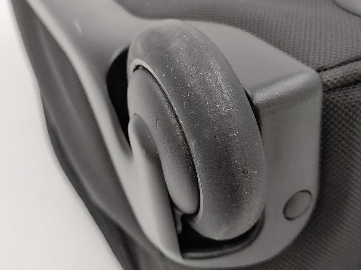 TUMI Boston bag with wheels and tag