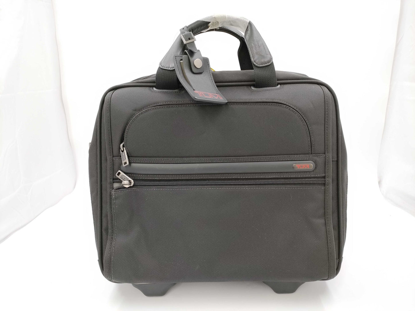 TUMI Boston bag with wheels and tag