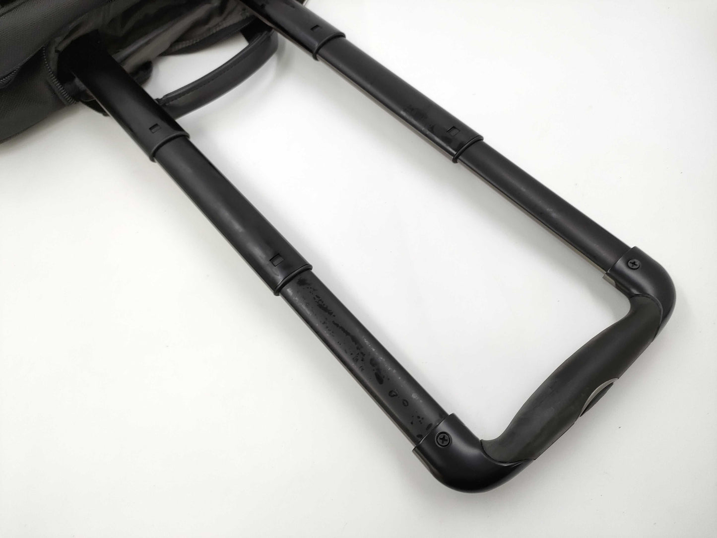 TUMI Boston bag with wheels and tag