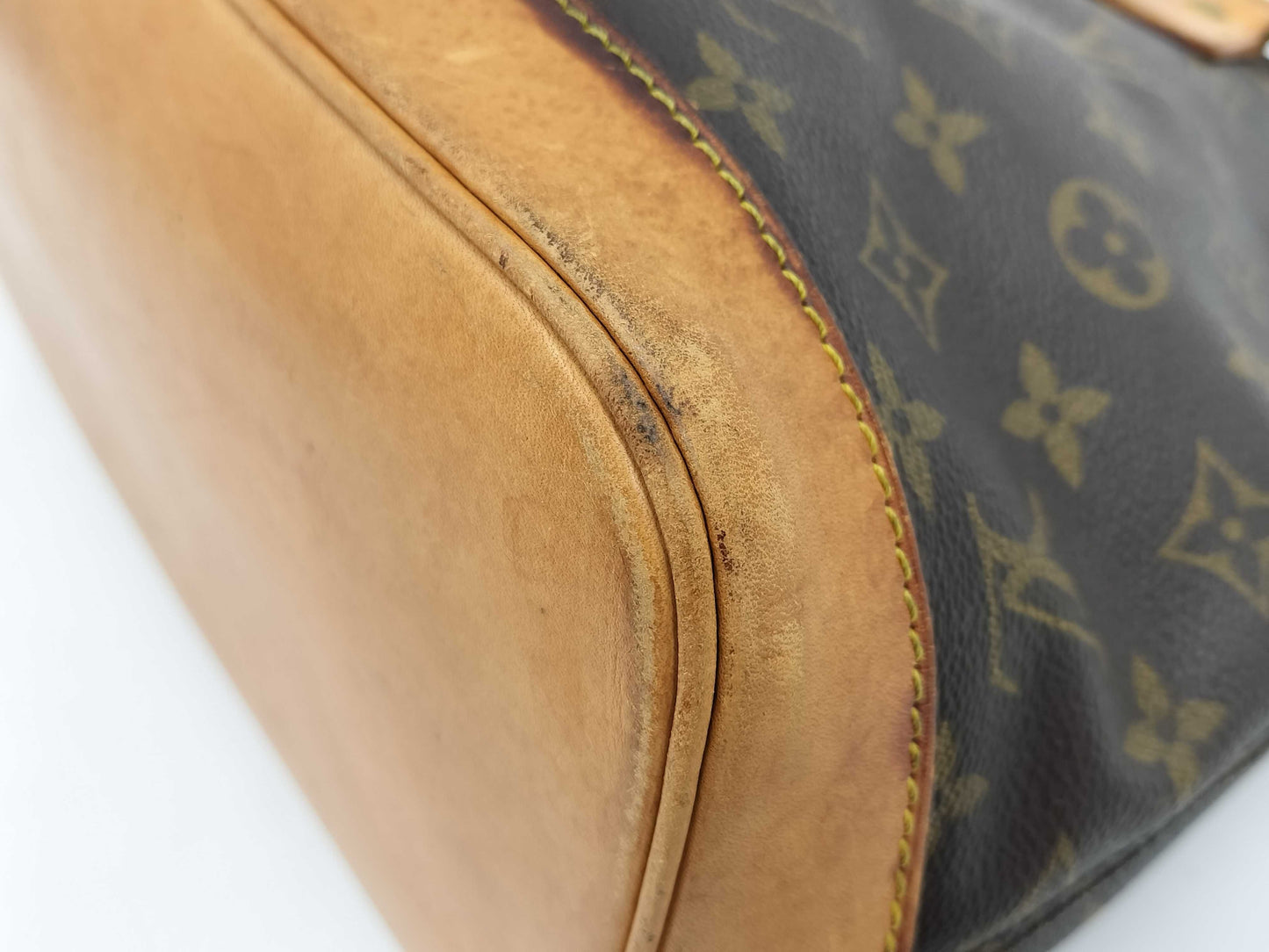 LOUIS VUITTON Monogram Alma Handbag
