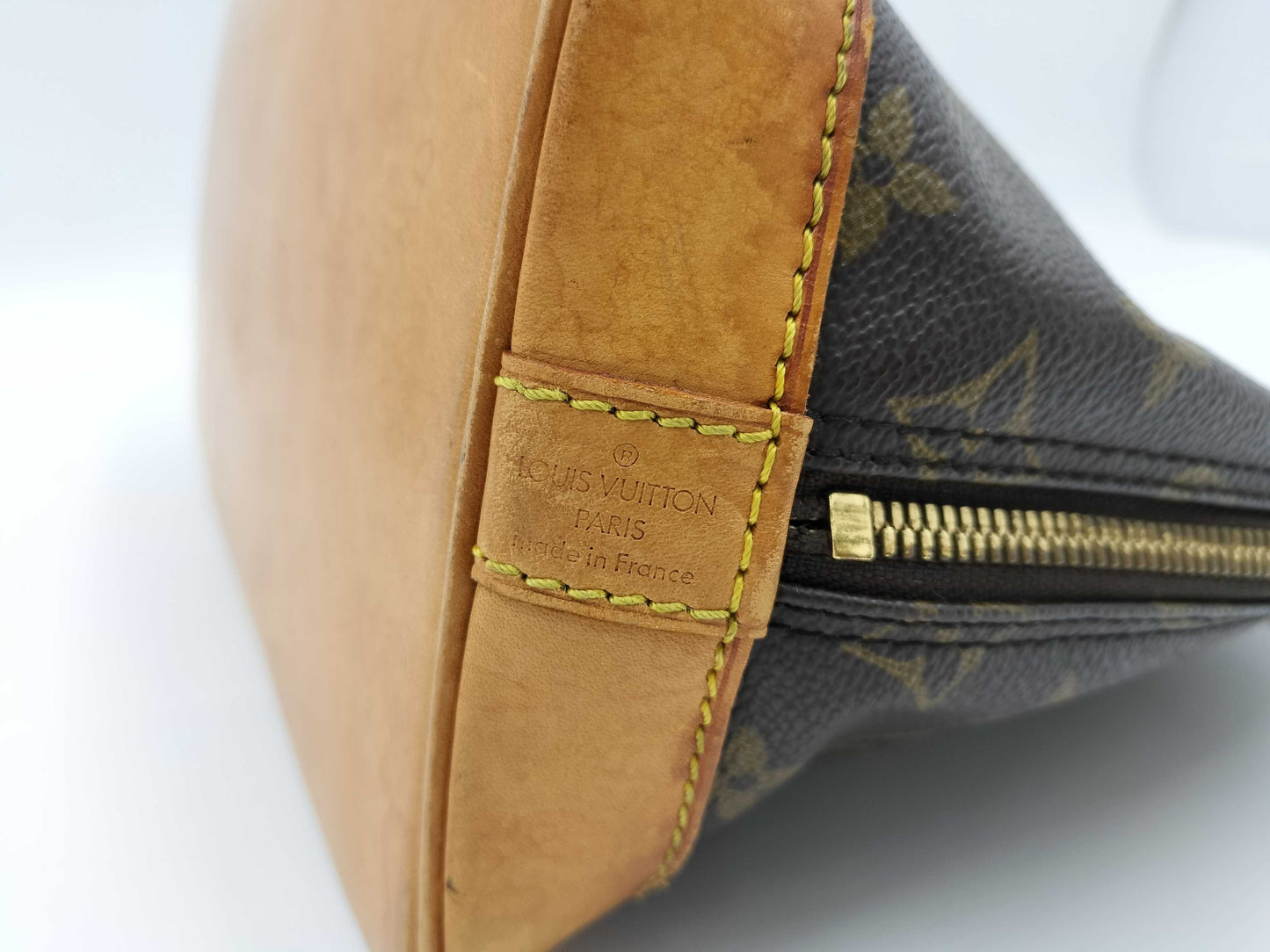 LOUIS VUITTON Monogram Alma Handbag