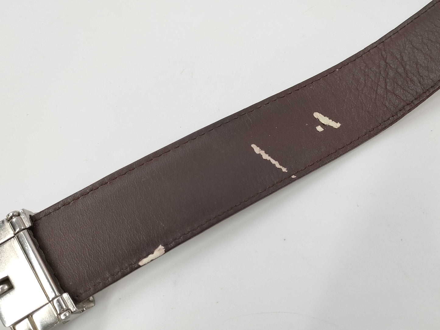 4 Salvatore Ferragamo belts: Gancini, Louis Vuitton, Burberry, and Coach.