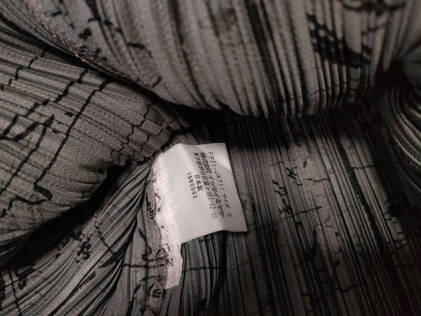 ISSEY MIYAKE Pleated Bottoms and All-Over Print Tops