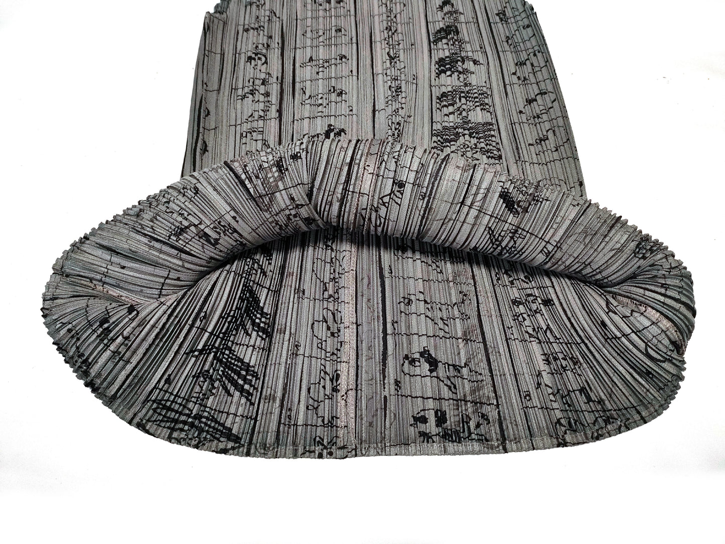 ISSEY MIYAKE Pleated Bottoms and All-Over Print Tops
