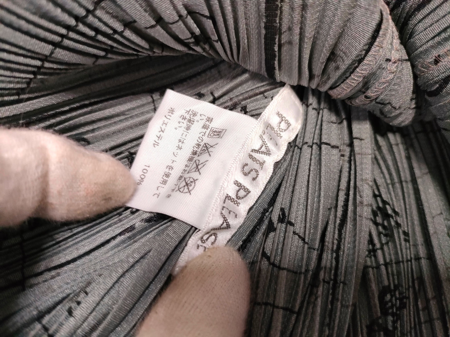 ISSEY MIYAKE Pleated Bottoms and All-Over Print Tops