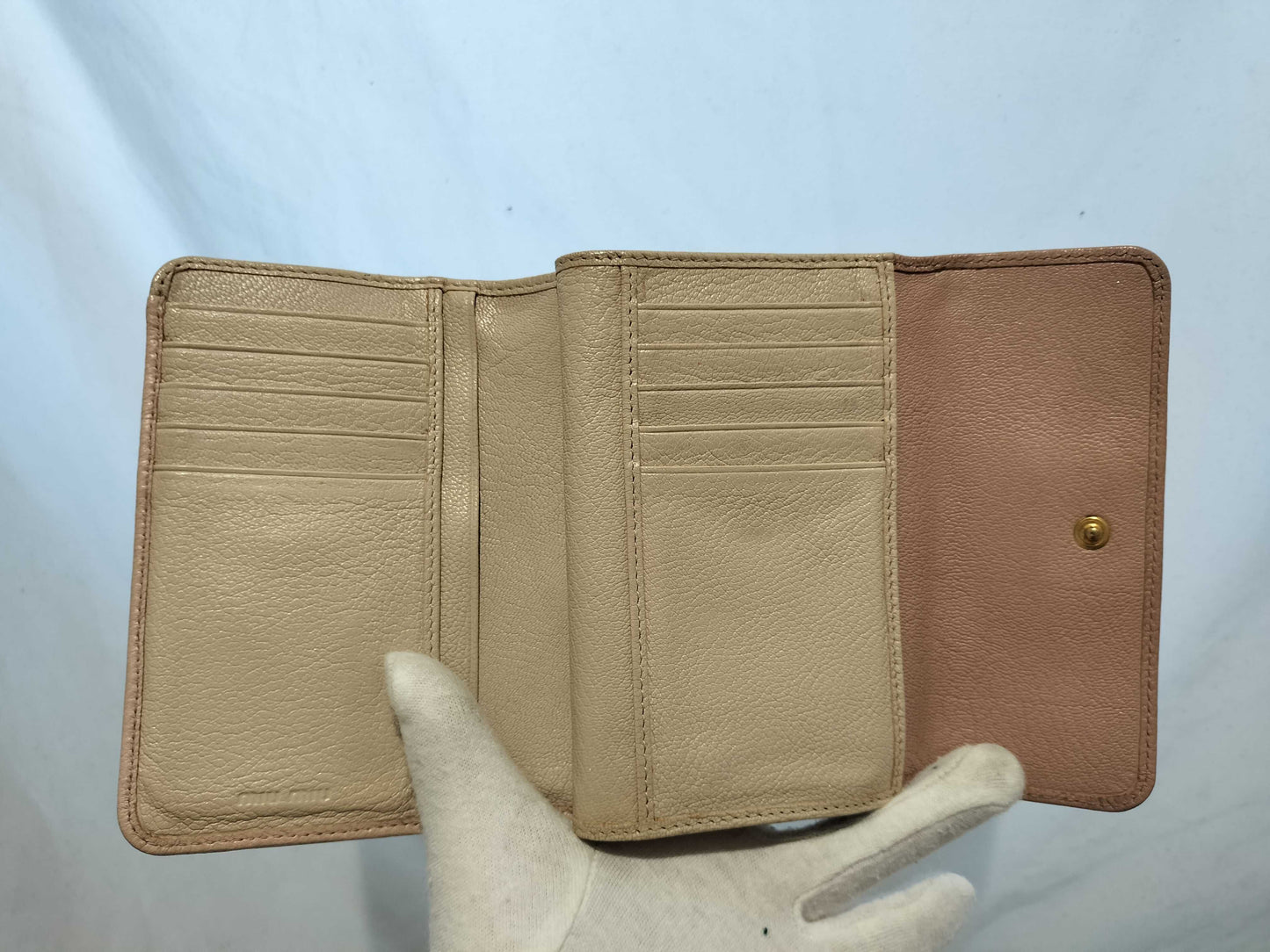 5-piece women's wallet featuring CHANEL, Coco Mark, Miu Miu, and other items.