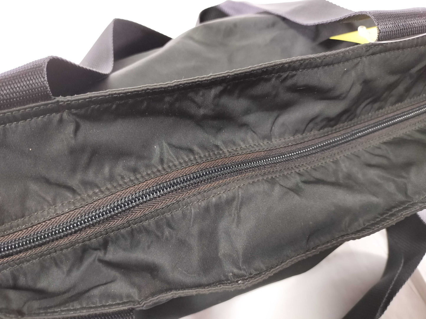 PRADA nylon triangular logo bag, zipper damage, condition considered. Tote bag