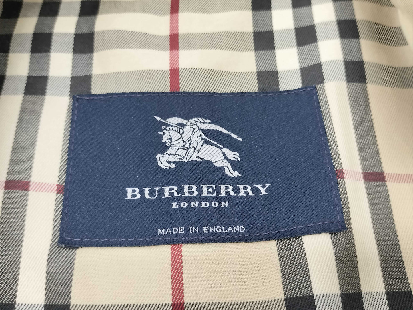 BURBERRY trench coat with torn sleeves