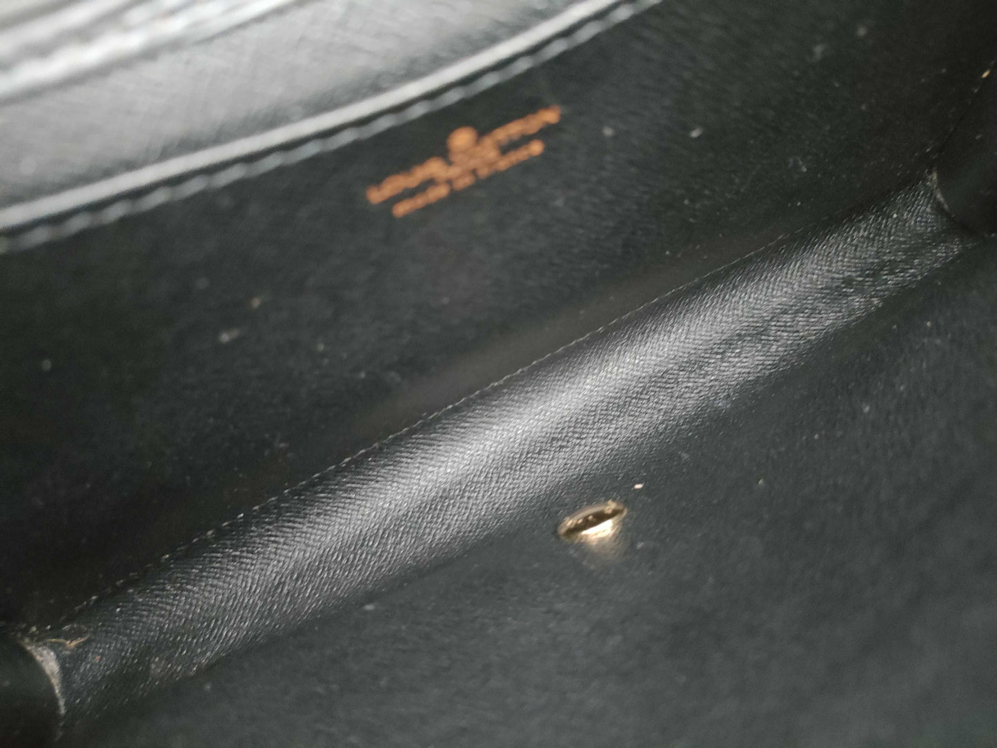 LOUIS VUITTON RFID verification failed. Epi Art Deco clutch bag M52632. Sticky interior.