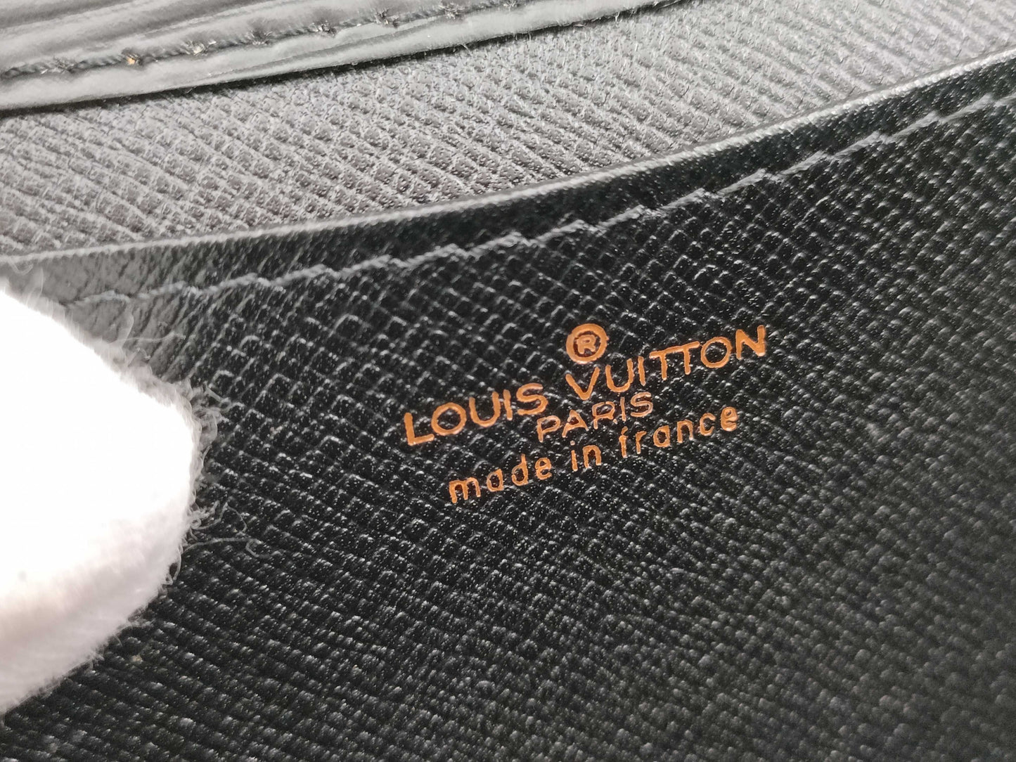 LOUIS VUITTON RFID verification failed. Epi Art Deco clutch bag M52632. Sticky interior.