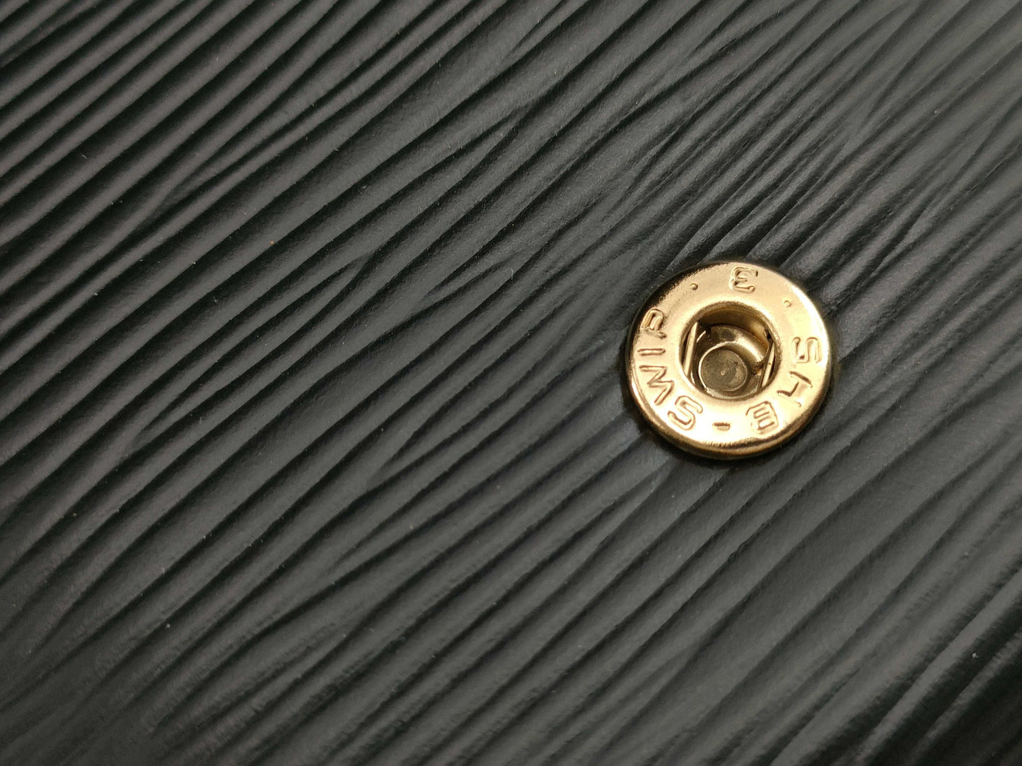 LOUIS VUITTON RFID verification failed. Epi Art Deco clutch bag M52632. Sticky interior.