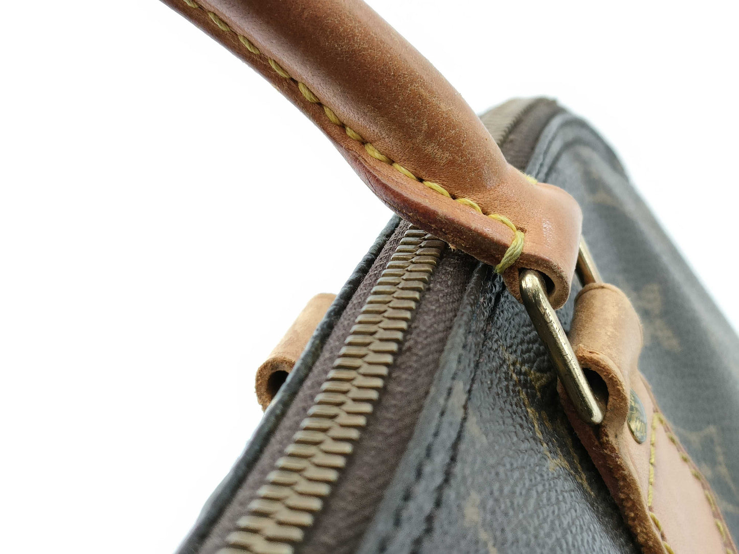 LOUIS VUITTON Monogram Alma Handbag