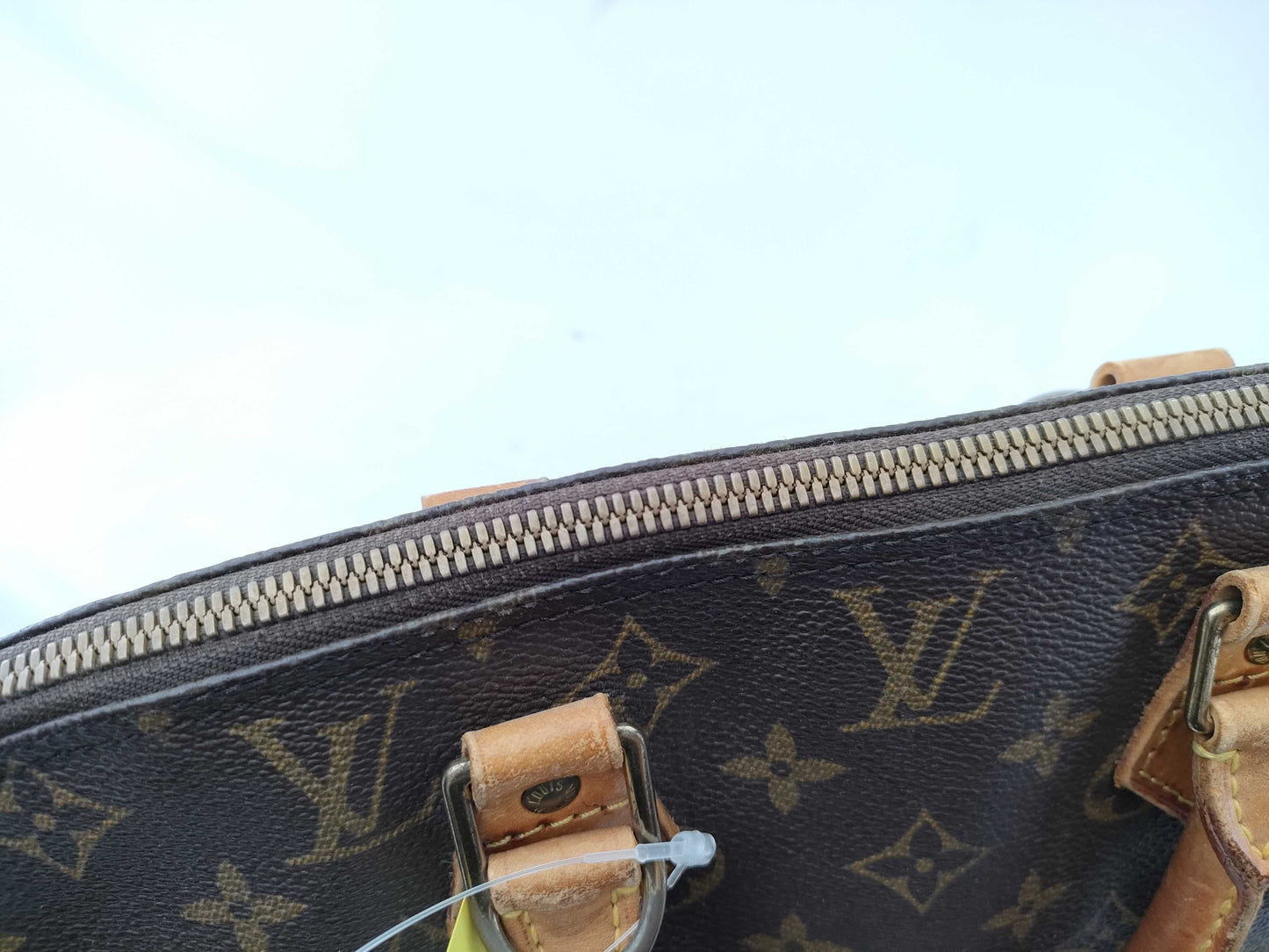 LOUIS VUITTON Monogram Alma Handbag