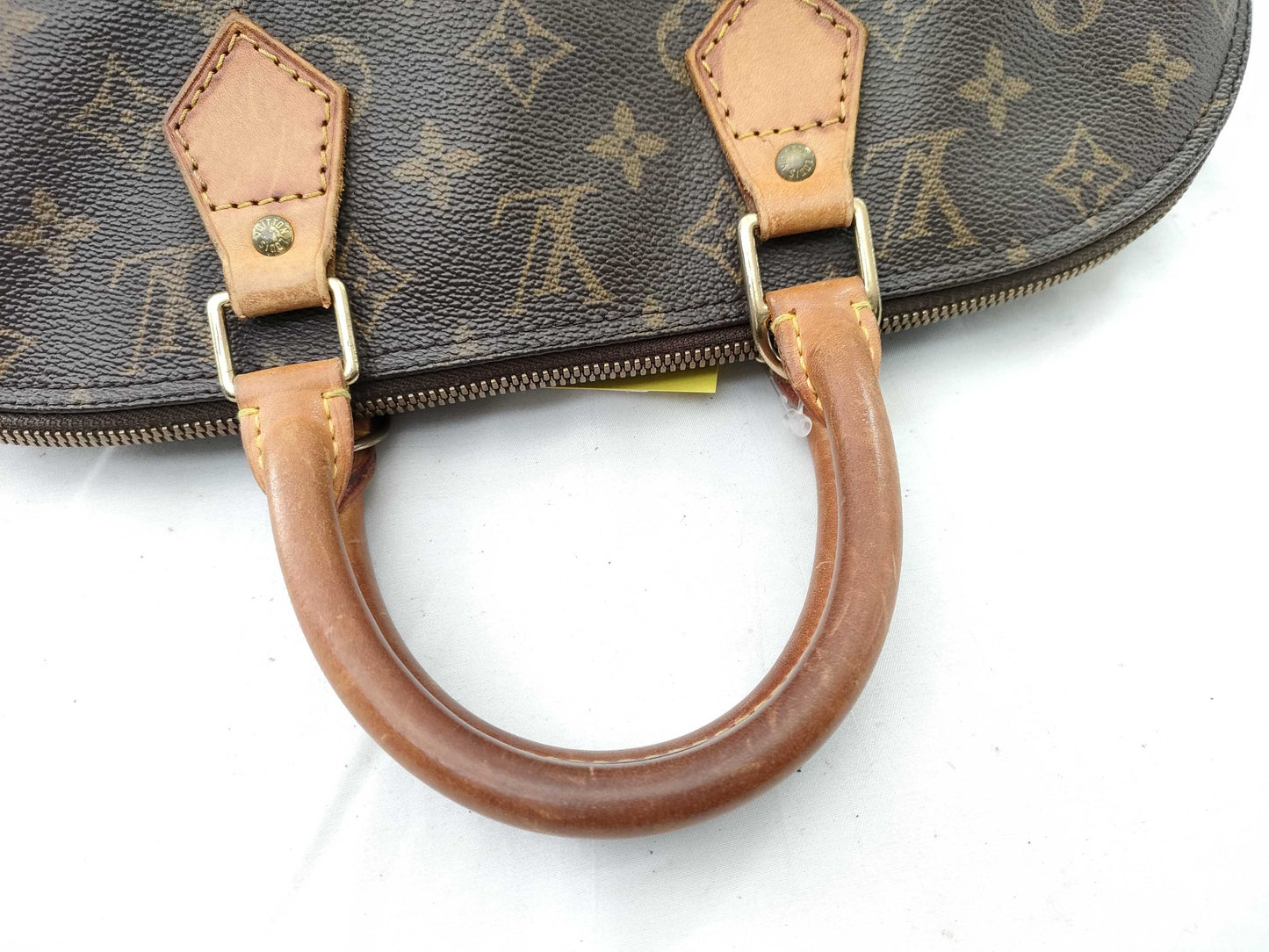 LOUIS VUITTON Monogram Alma Handbag