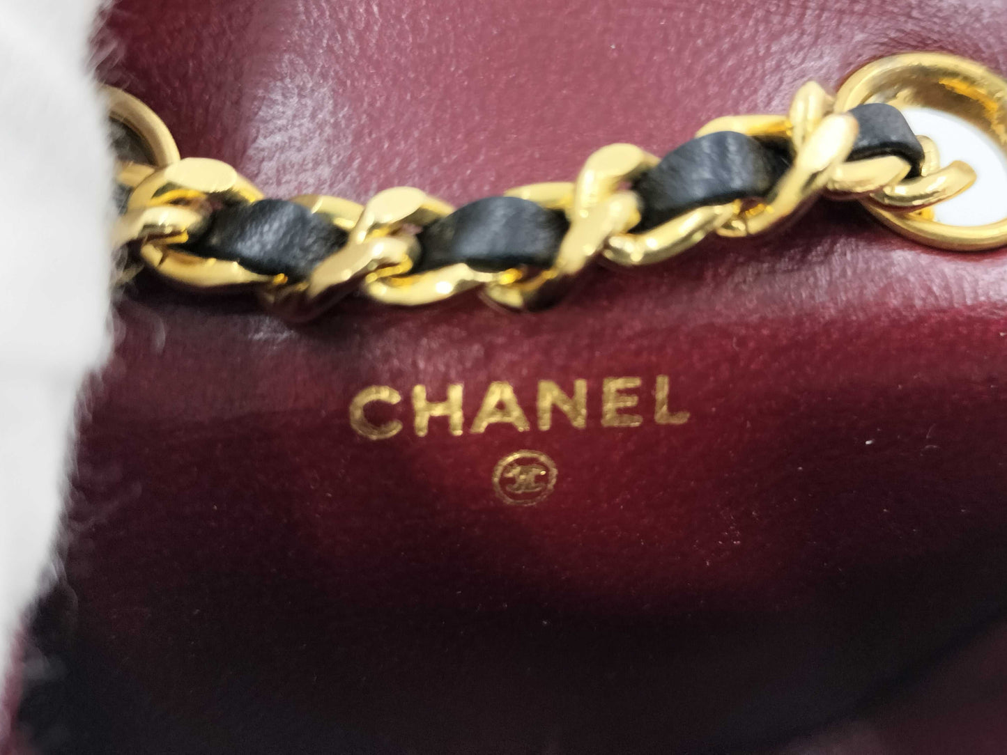 CHANEL Lambskin Mini Matelasse Shoulder Bag with Chain Belt