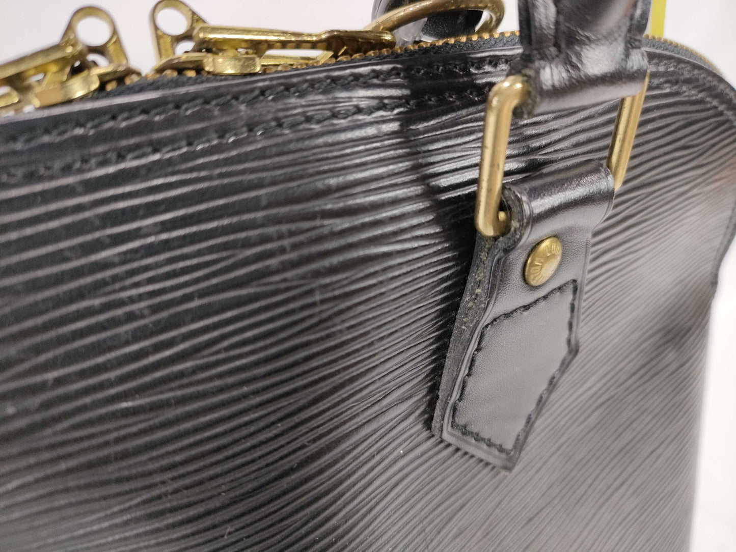 LOUIS VUITTON Epi Alma Noir Handbag