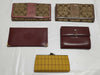 5-piece wallet set including COACH and Cartier