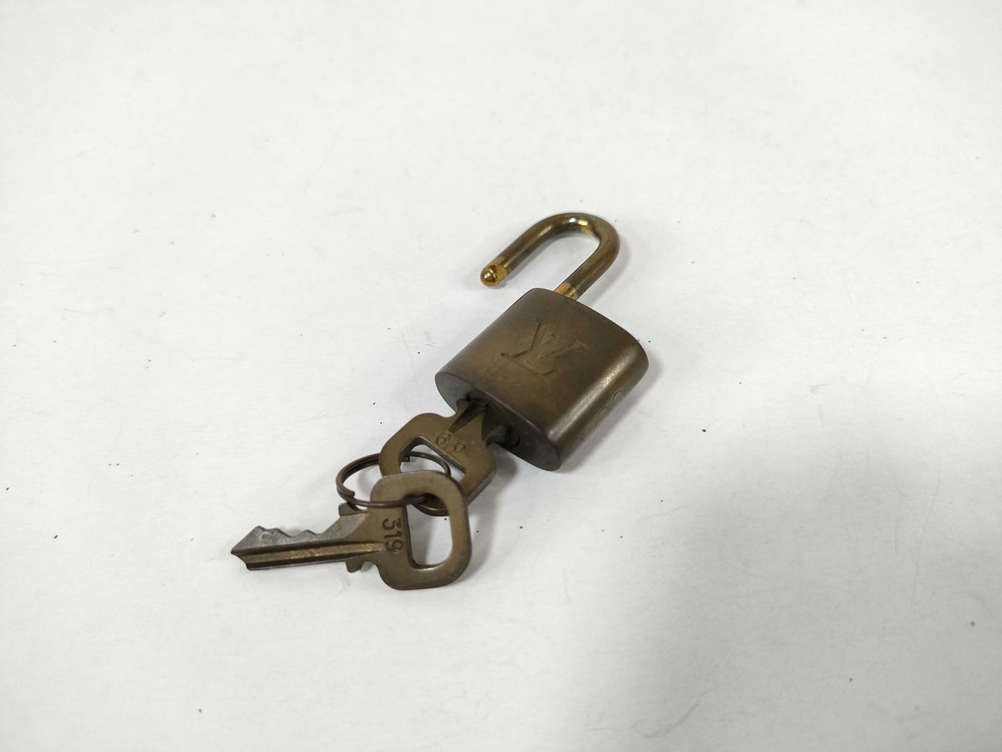 LOUIS VUITTON Padlock Set