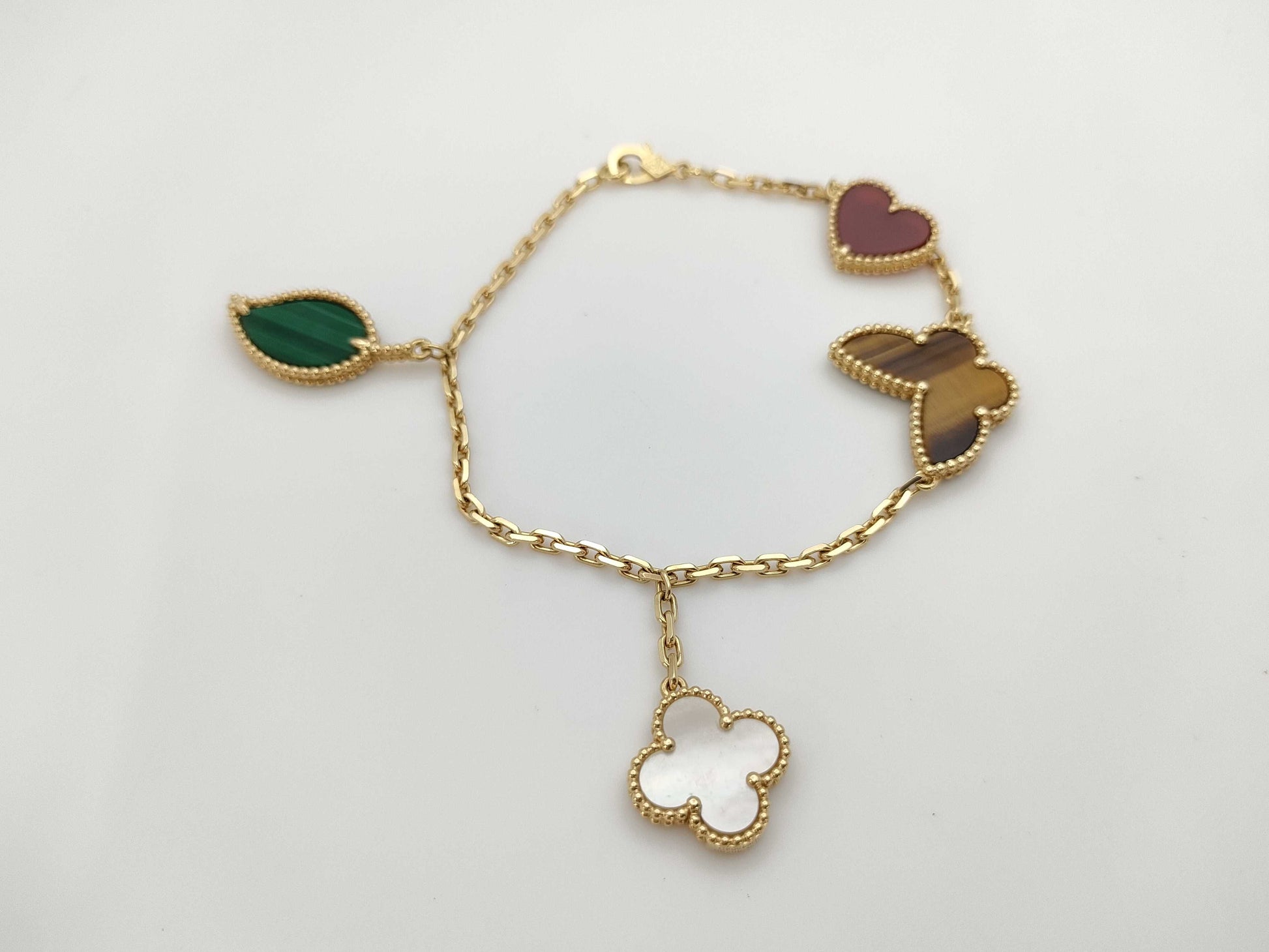 Van Cleef&Arpels Lucky Alhambra Multi 4P Motif YG Au750 13.2g Bracelet Bangle