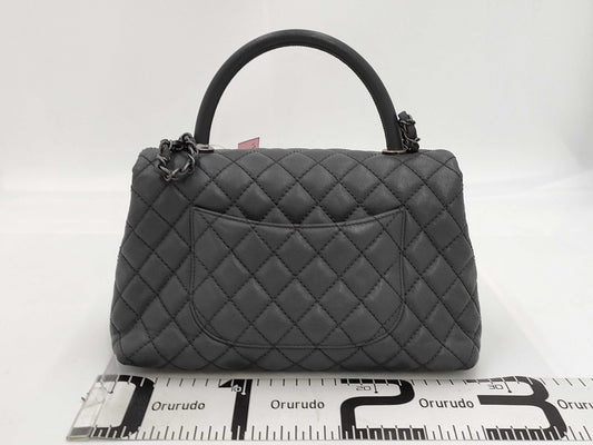 CHANEL Caviar Skin Top Handle Caviar Skin Turnlock Shoulder Bag