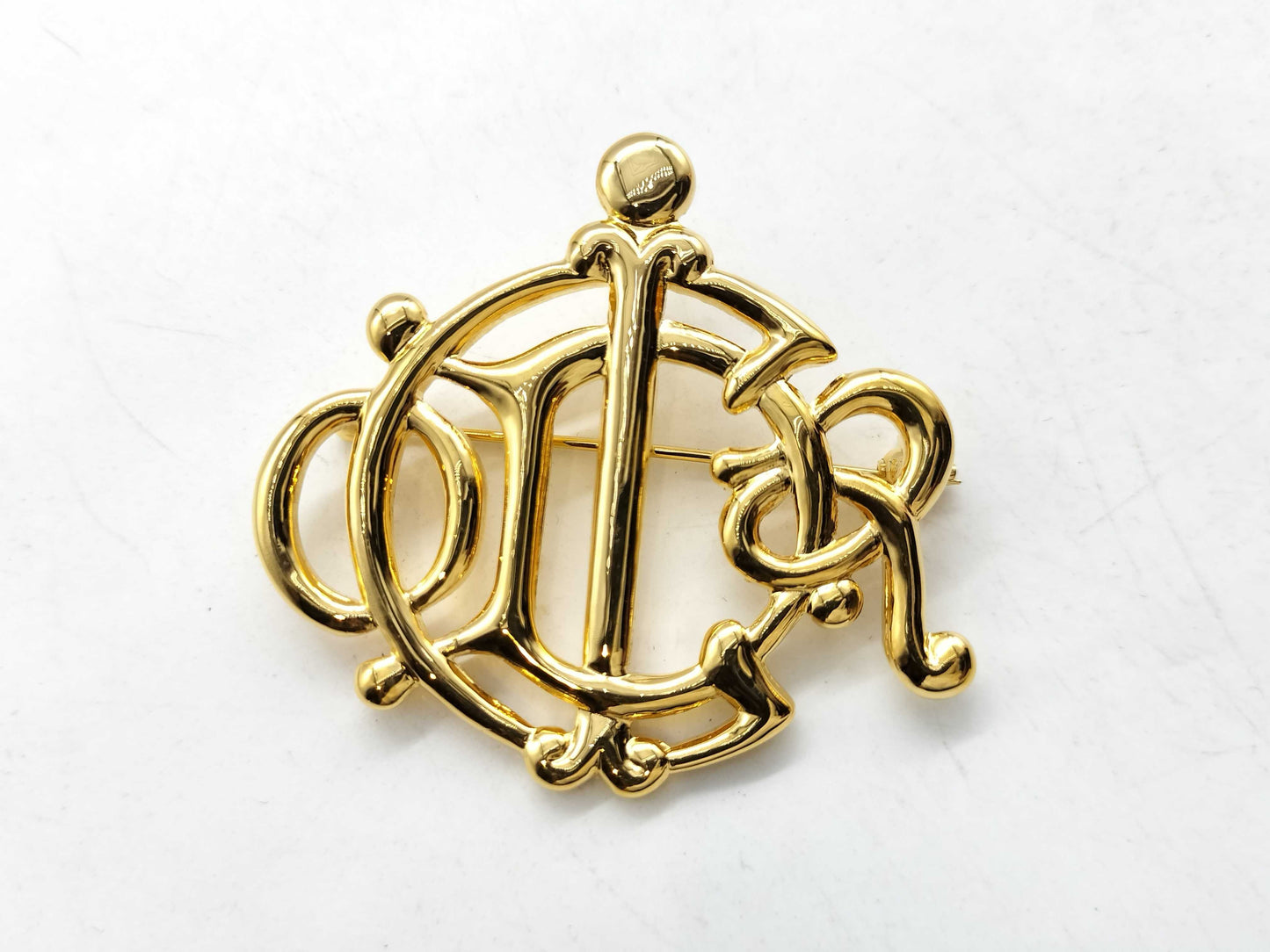 Dior logo brooch brooch