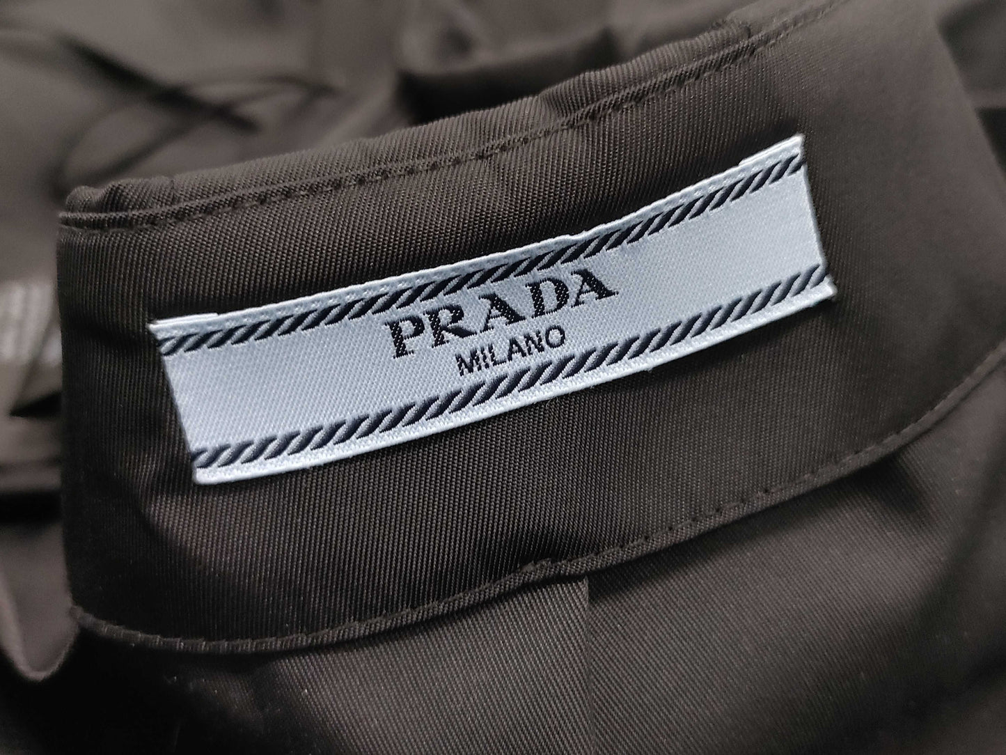 PRADA Skirt with nylon belt and triangle plate, black skirt