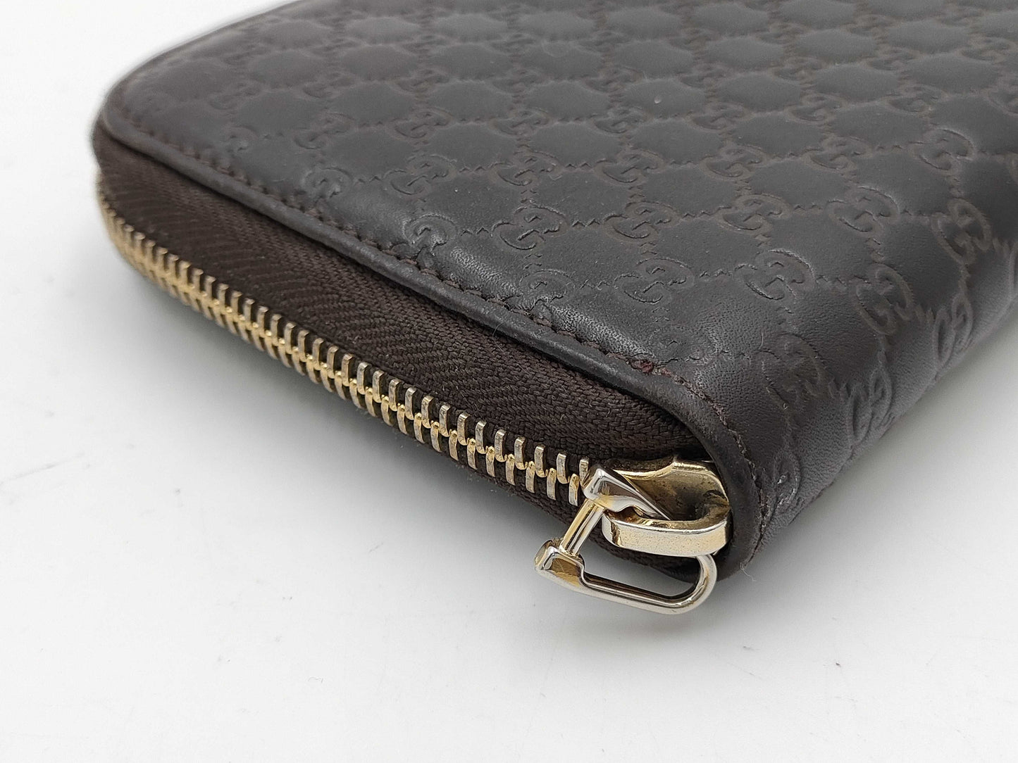 GUCCI Microsima GG Round Zip Wallet in Dark Brown