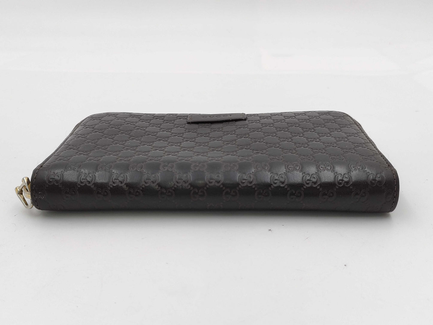 GUCCI Microsima GG Round Zip Wallet in Dark Brown