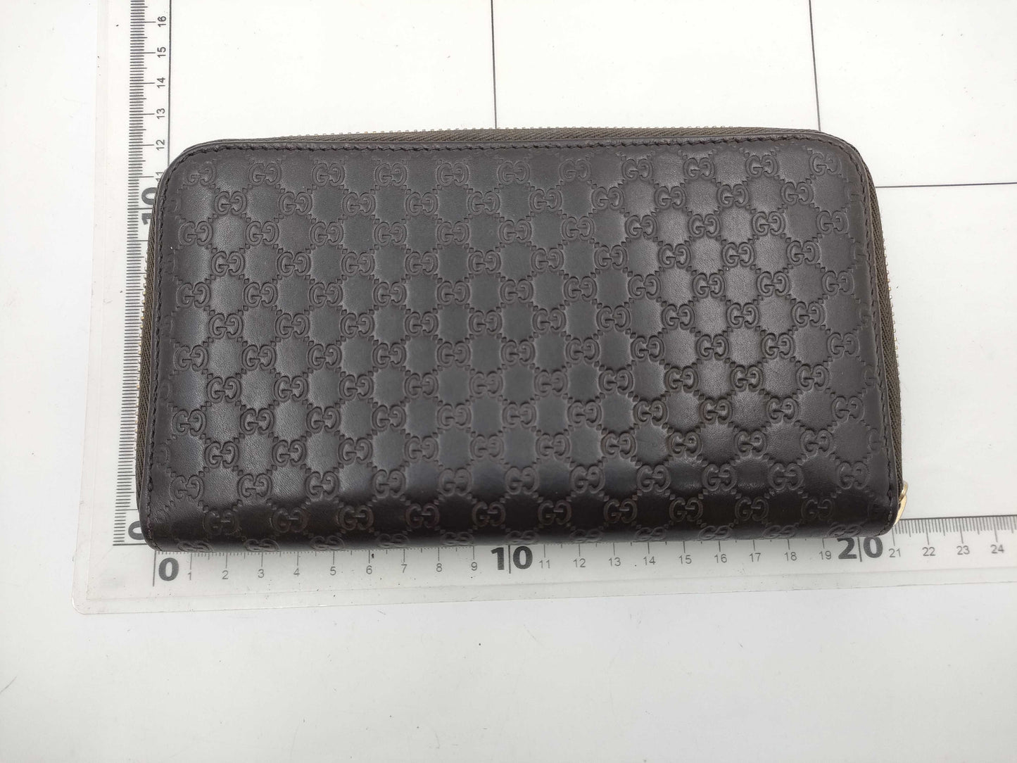 GUCCI Microsima GG Round Zip Wallet in Dark Brown