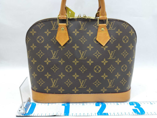 LOUIS VUITTON Monogram Alma Handbag