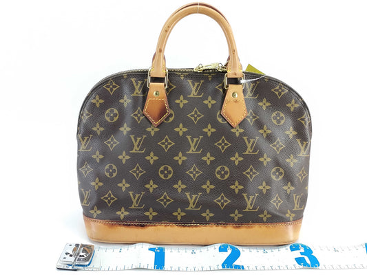 LOUIS VUITTON Monogram Alma PM Handbag