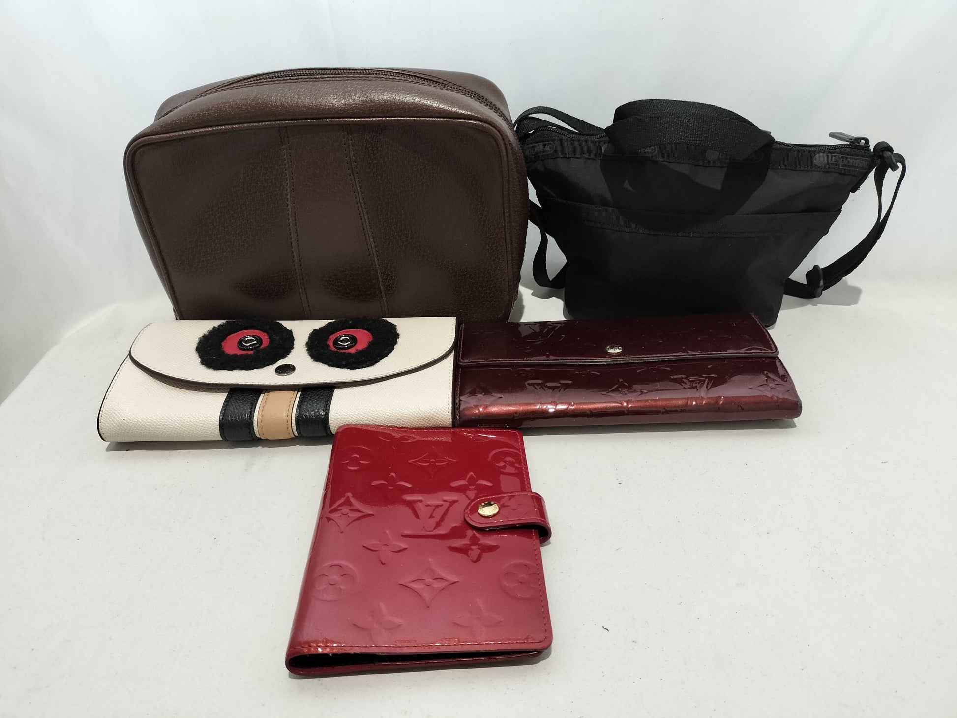 LOUIS VUITTON Vernis wallet set including Louis Vuitton wallet, Coach wallet, and Fendi bag.