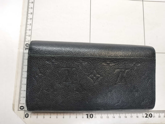 LOUIS VUITTON Monogram Empreinte Giant Monogram Reverse Portefeuille Zoe Wallet
