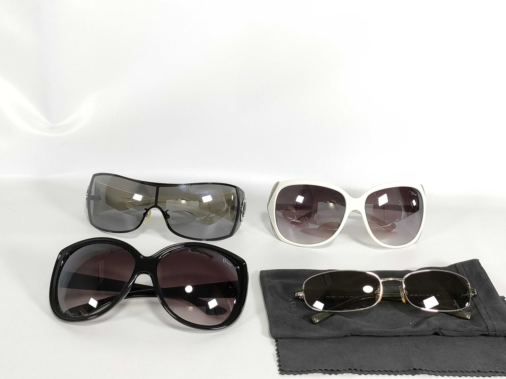 Prada, Dior, and other sunglasses, total of 4 items, sunglasses and glasses