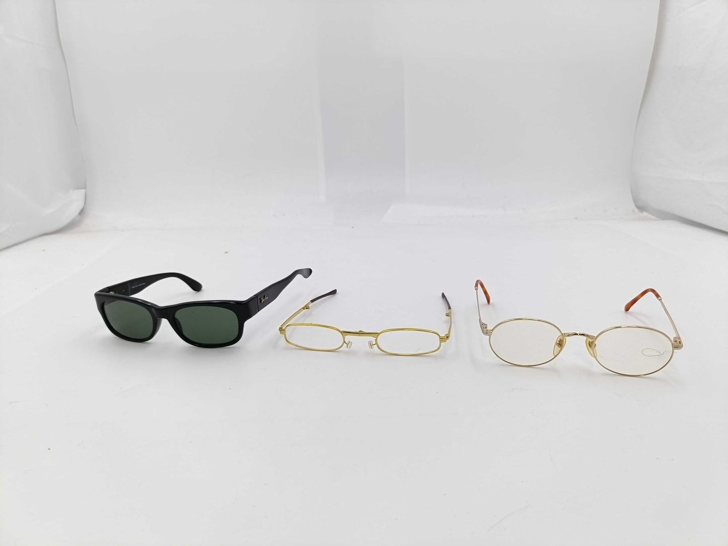 RayBan/Yves Saint Laurent sunglasses/glasses