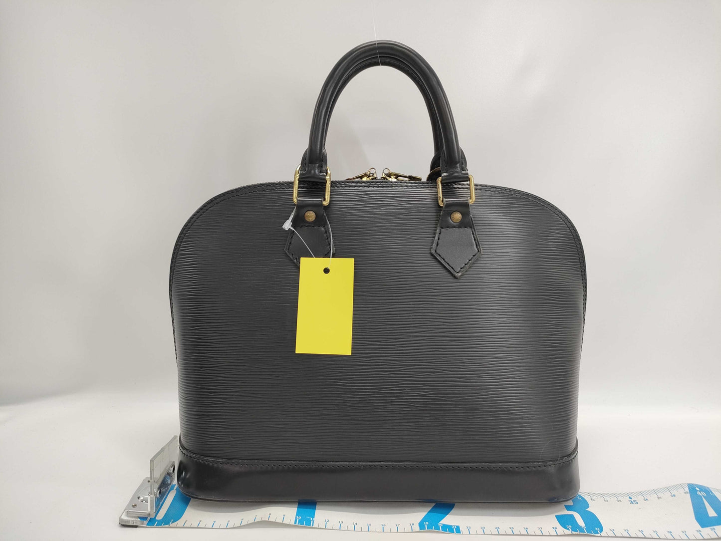 LOUIS VUITTON Epi Alma PM Noir Handbag