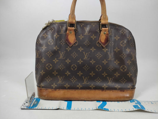 LOUIS VUITTON Monogram Alma Handbag