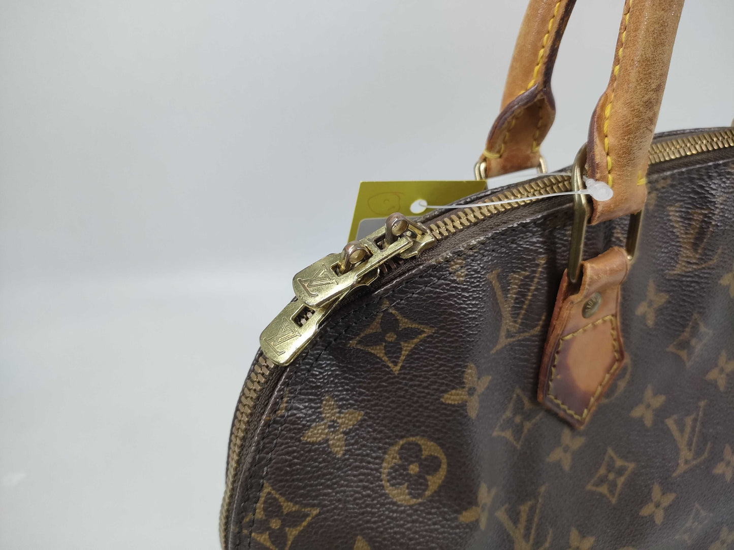 LOUIS VUITTON Monogram Alma Handbag