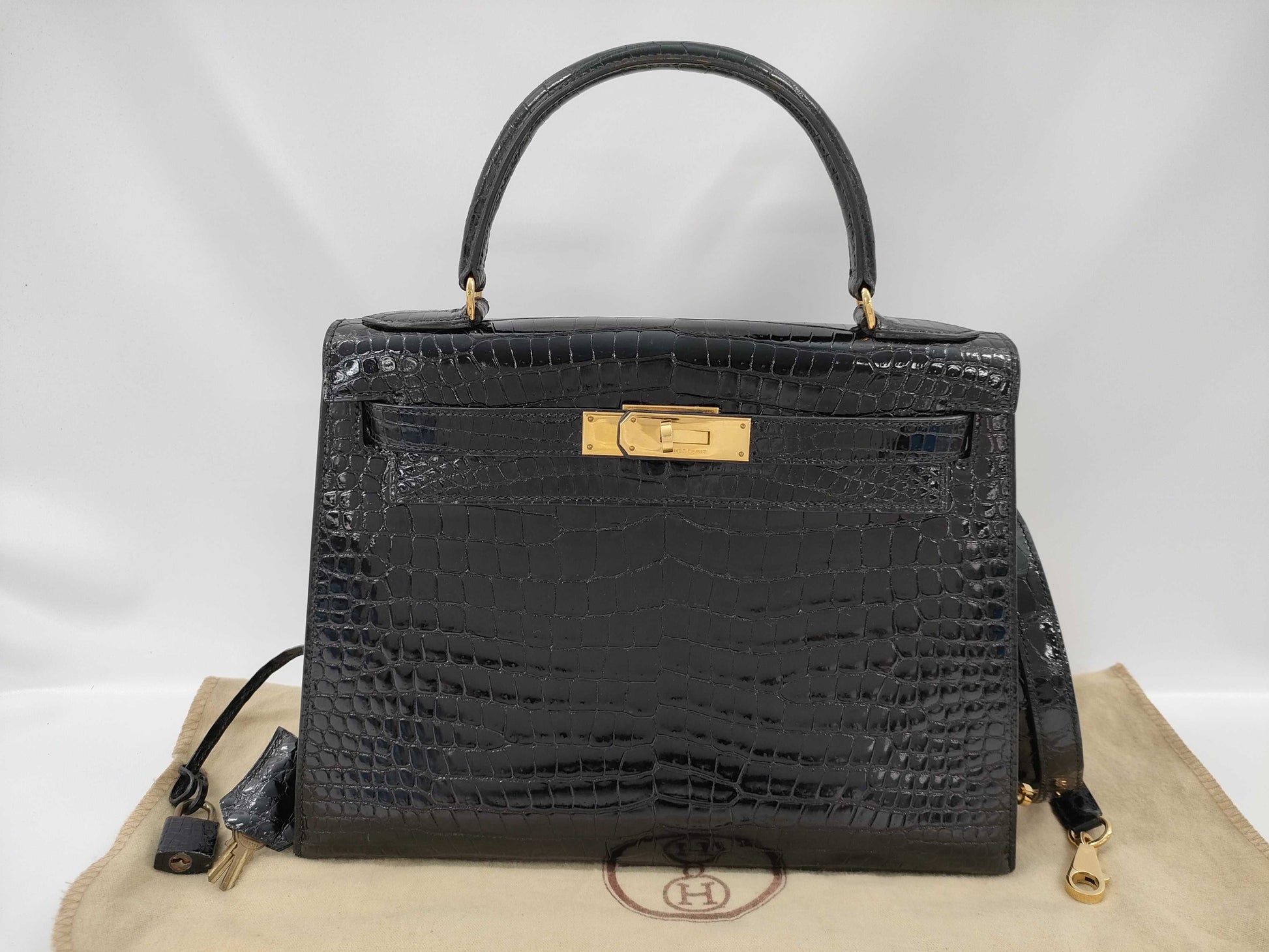 HERMES Kelly 28 Black Handbag with Gold Hardware and G Stamp